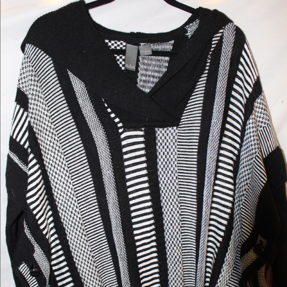 Black and white shrug sweater with fun pattern!